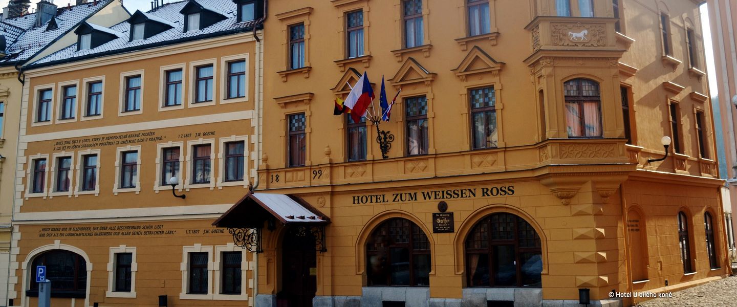 © Hotel U bílého kon?